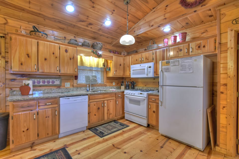 Fully stocked kitchen with everything you would need to cook a meal or two