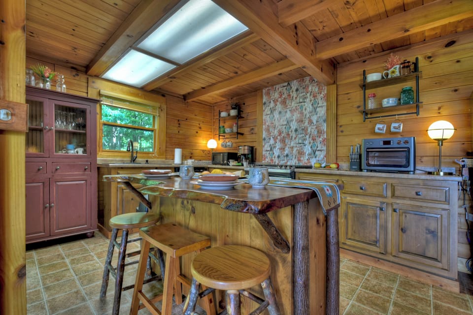 Convenient island area for meal prep to share a glass of wine