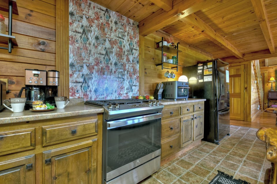 Fully stocked kitchen at this romantic cabin getaway in North GA