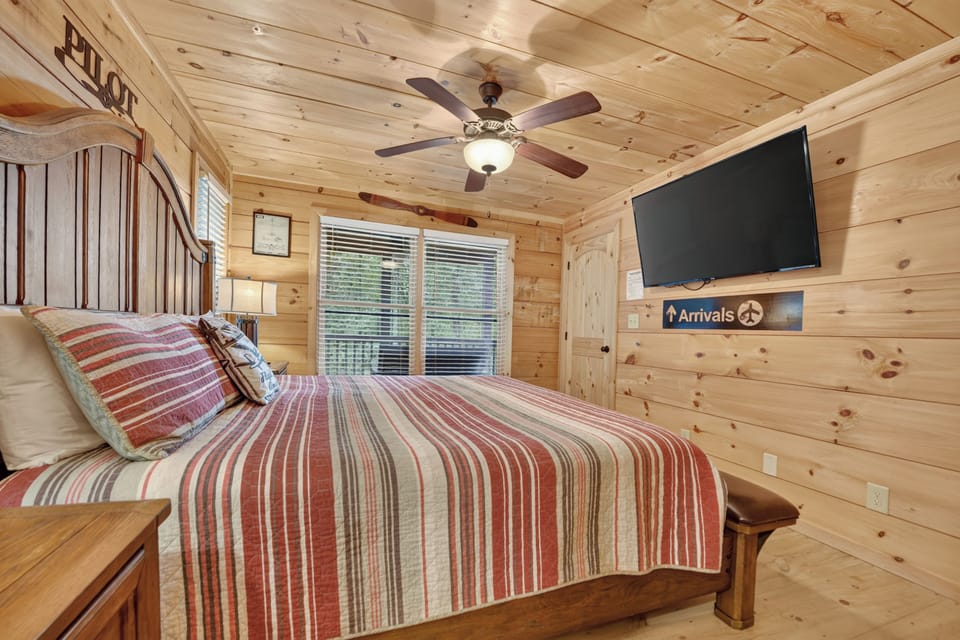 This second bedroom also features a TV and an ensuite bathroom, giving it the feel of a private suite