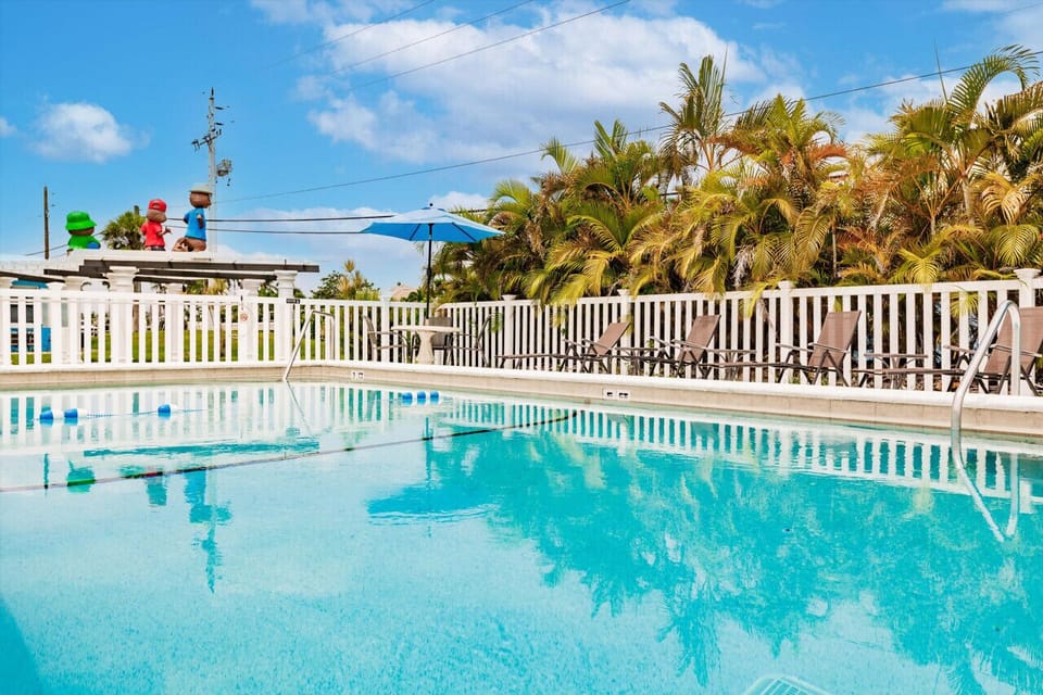 Fenced pool area providing a safe and relaxing swimming experience.