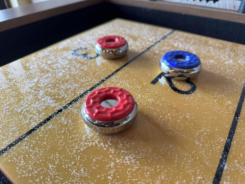 The Pac-Man machine and shuffleboard table will provide hours of fun!