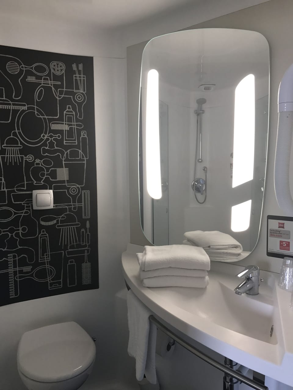 Shower, eco-friendly toiletries, hair dryer, towels