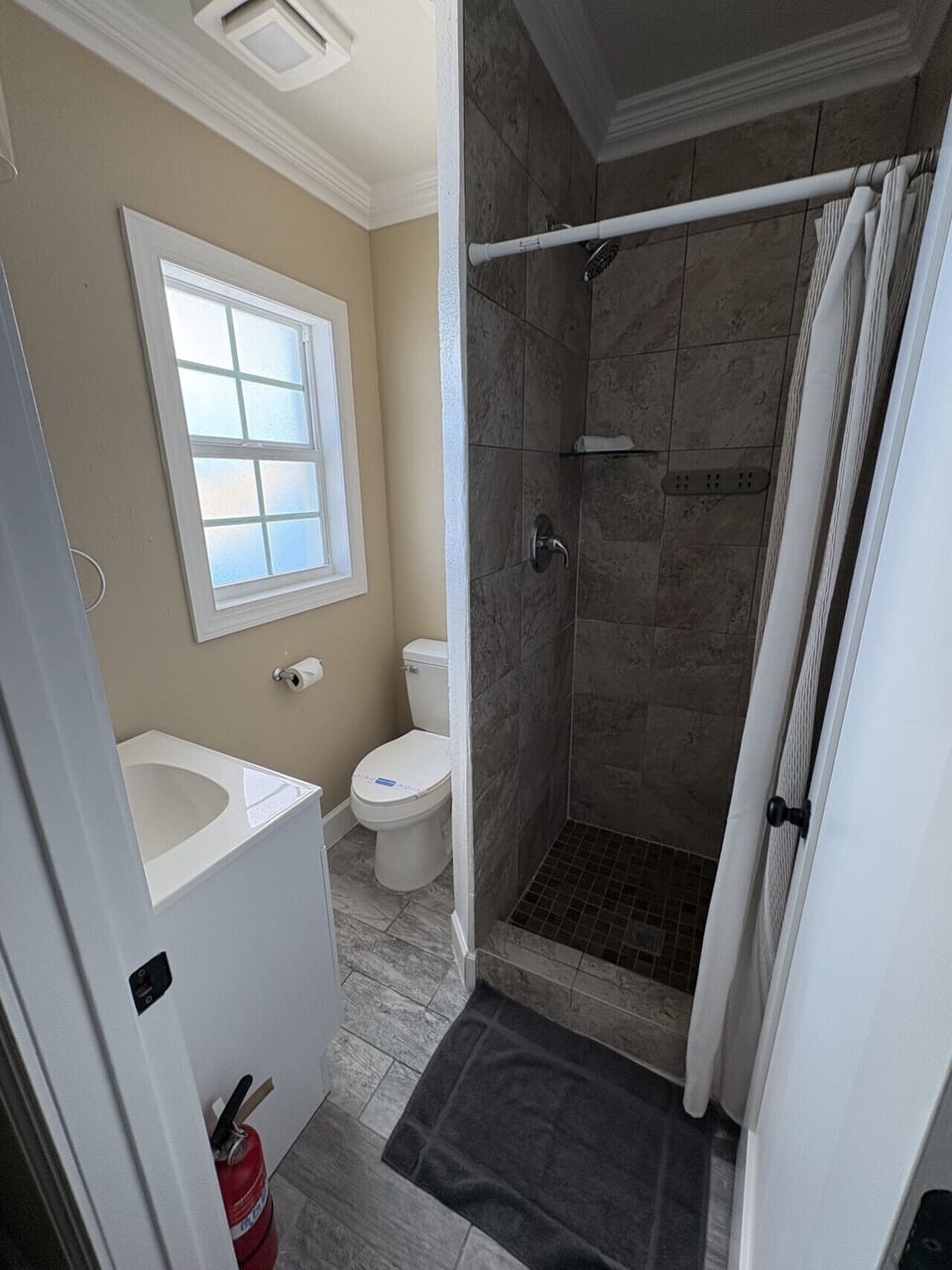 Full size bathroom with shower