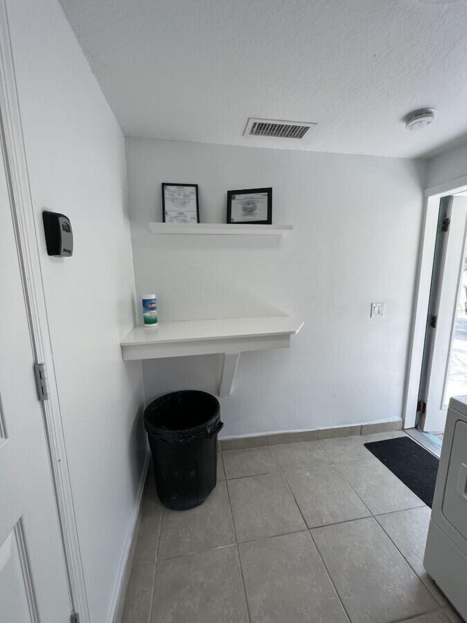 Coin operated laundry room w/ folding station