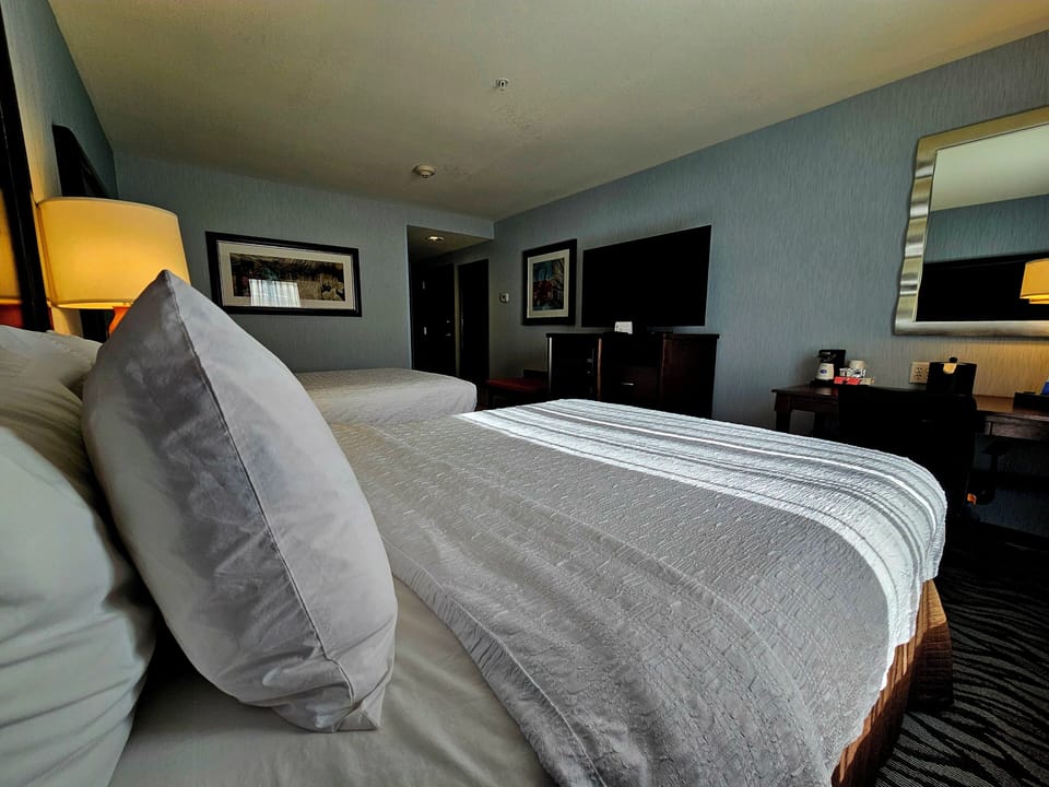 Room, 2 Queen Beds, Refrigerator & Microwave | In-room safe, desk, free WiFi, bed sheets