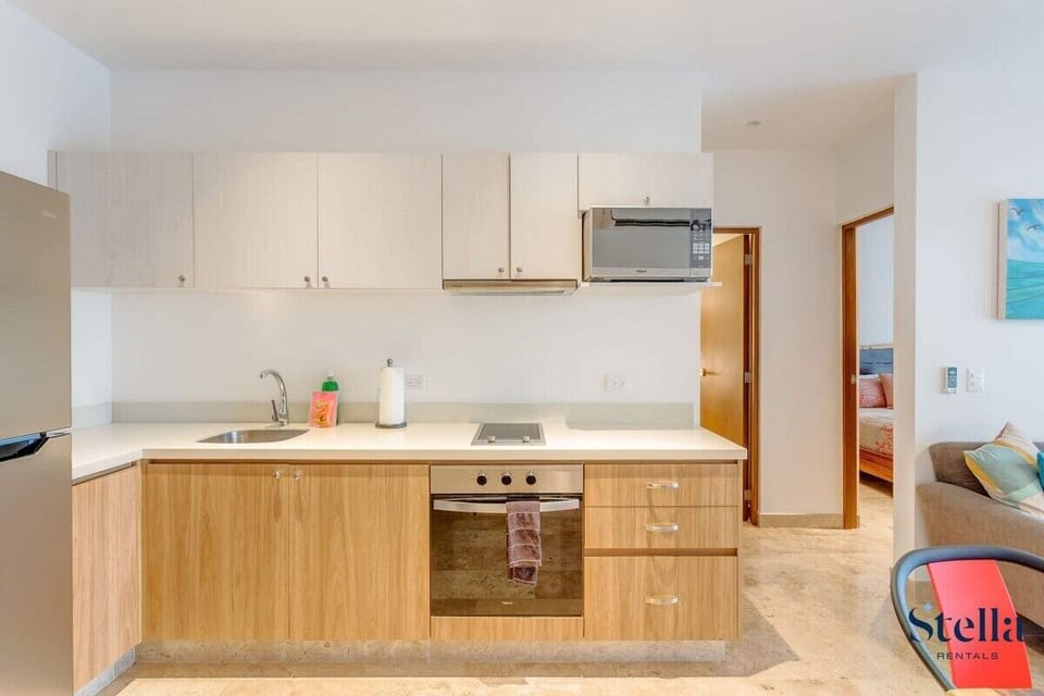 Whip up gourmet meals in your fully equipped modern kitchen with premium appliances!


