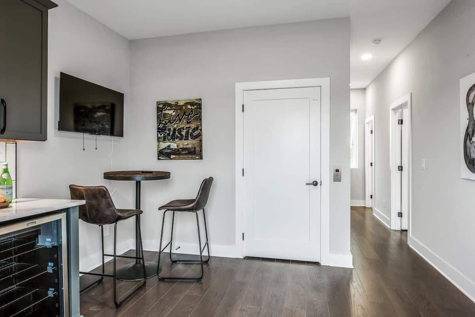 Top floor wet bar area that leads to the rooftop patio.