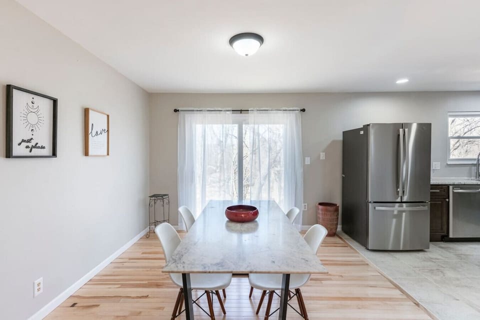 Dinning area , elegant marble table , fridge