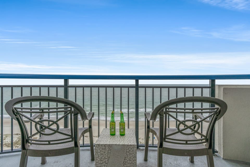 Enjoy stunning ocean views from your private balcony, perfect for relaxing with a drink. 
