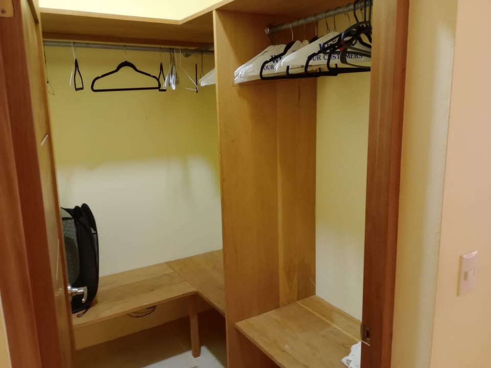 The walk in closet with a switch for 100 meg internet.