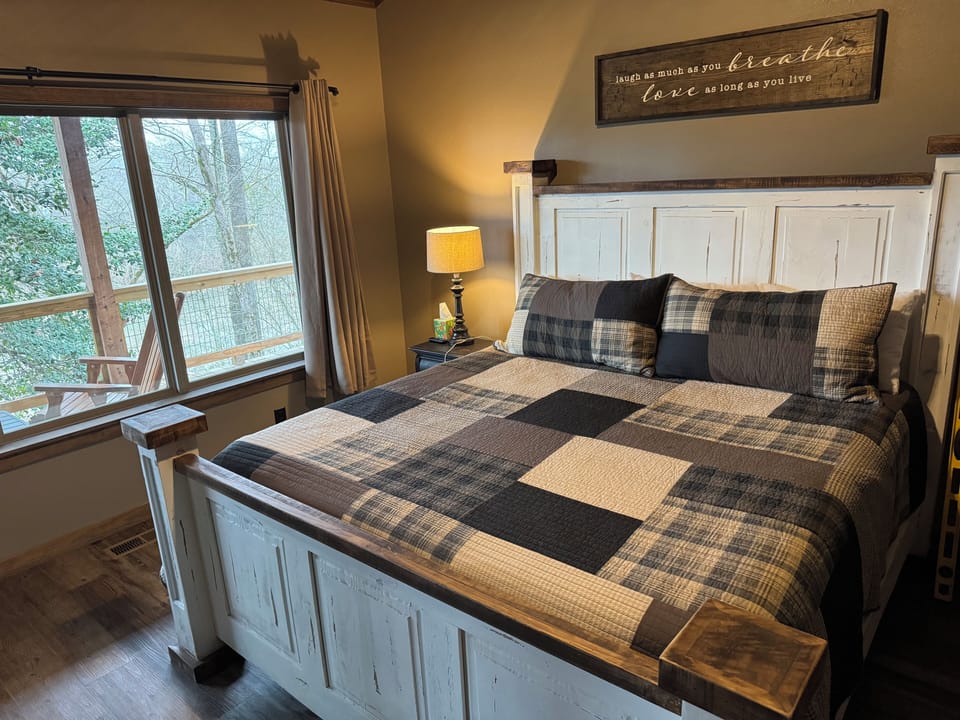 Master Bedroom with King Bed and view of the Caddo River