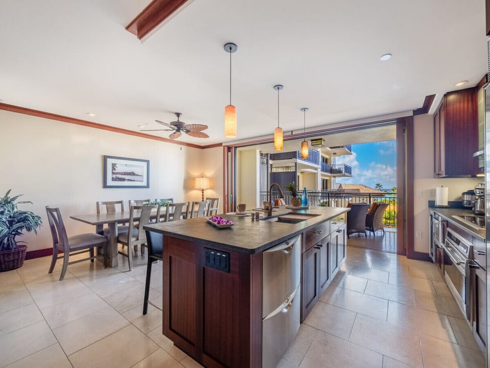 Open concept kitchen with large island to gather around.