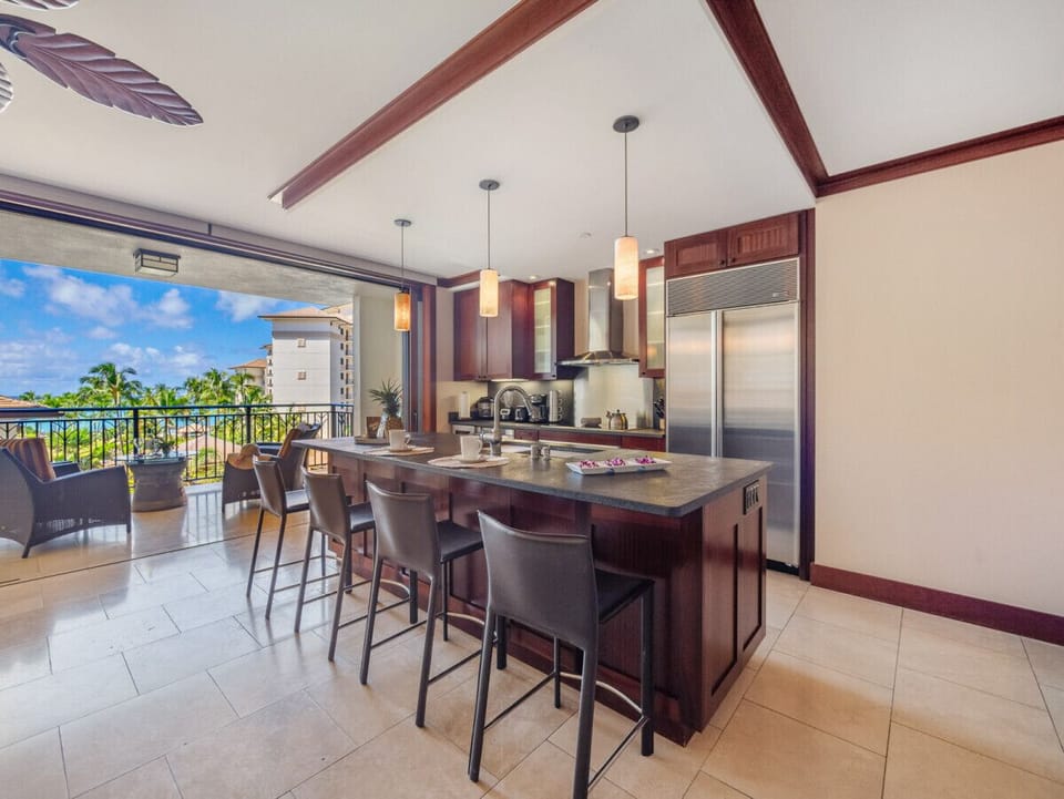 Open concept kitchen with large island to gather around.