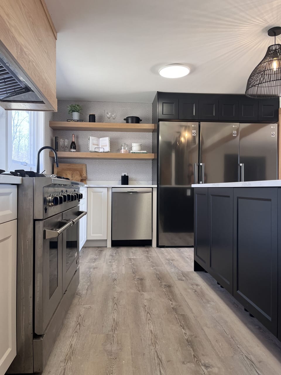 Three fridge + freezer combo and a 48” gas range