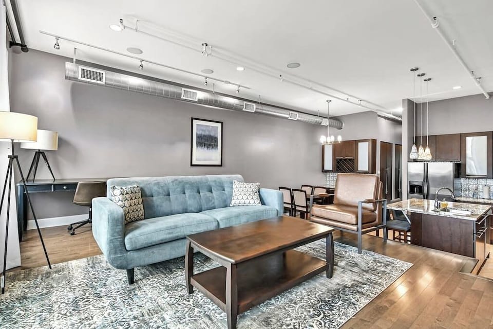 Living Room / Dining Room combo with fully stocked kitchen