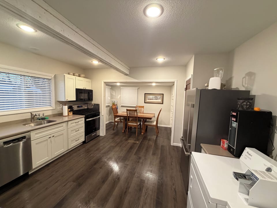 Large well equipped kitchen with new finishes and appliances, big dining table!