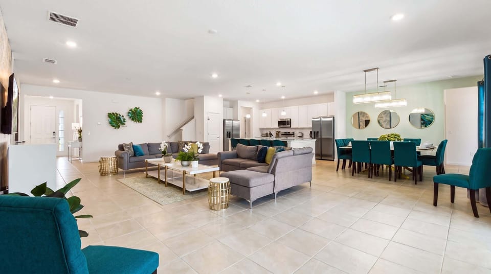 Spacious open-concept home with elegant décor, modern kitchen, and cozy seating!