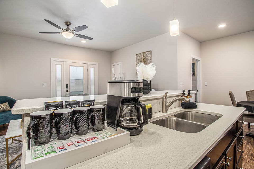 Start your mornings off right with complimentary coffee and tea, provided for your convenience. Sip from our stylish cups and brew a fresh cup with our easy-to-use coffee maker.