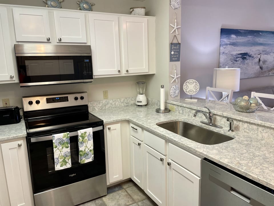 Kitchen with new appliances and granite counter tops