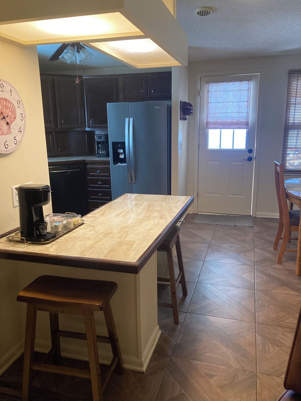 Convenient serving bar w/ 2nd coffee station.  Fridge w/filtered water and ice.