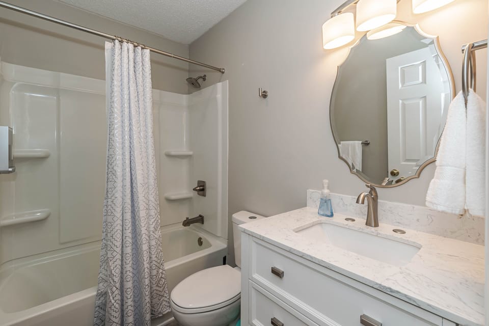 Downstairs full bathroom. Includes towels, shampoo, conditioner, & body wash