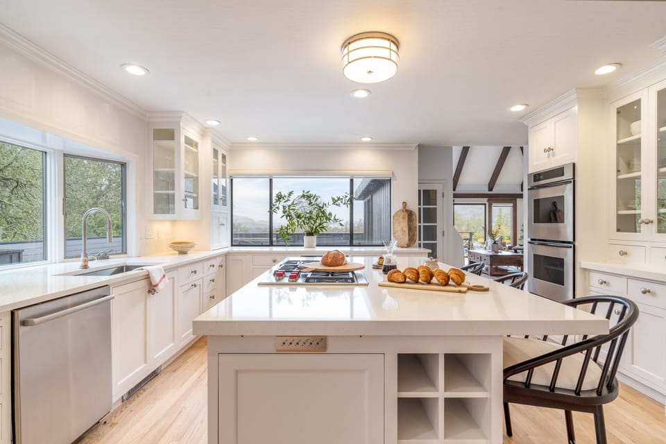 Spacious kitchen with a gas range.