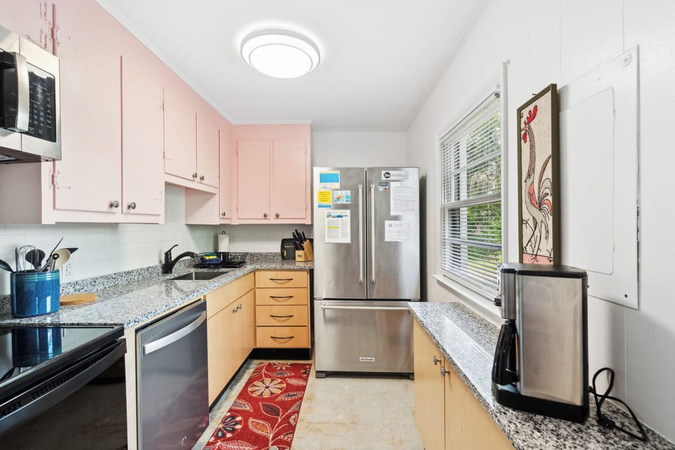 This home has vintage cabinets stocked with all the cookware, serving dishes and utensils you will need to cook and serve meals. We also include small appliances such as blender, coffee maker and microwave.