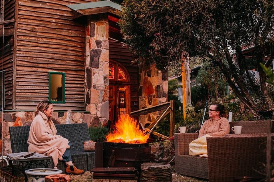 Gather ’round the fire—share stories, laughter, and warm drinks under the alpine sky.