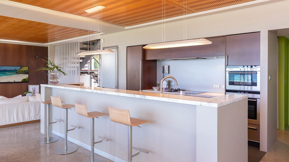 Modern Kitchen with Island and Bar Stools