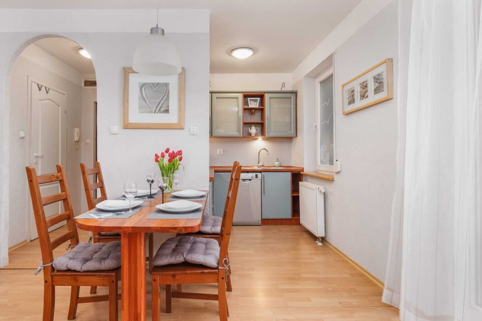 A dining and living area with an open layout, designed for comfort and convenience.
