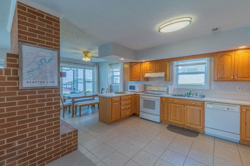 Large kitchen leading into dining area. 