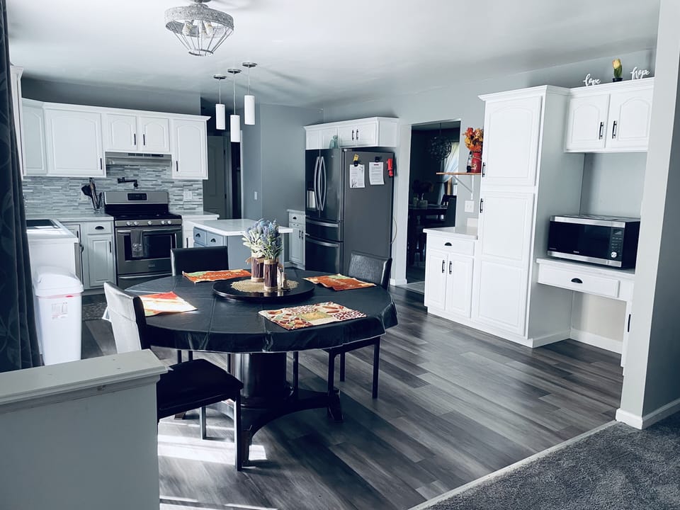 Plenty of room around the kitchen table, right in the heart of our home!