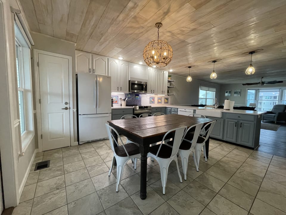 Kitchen with table that seats 8.