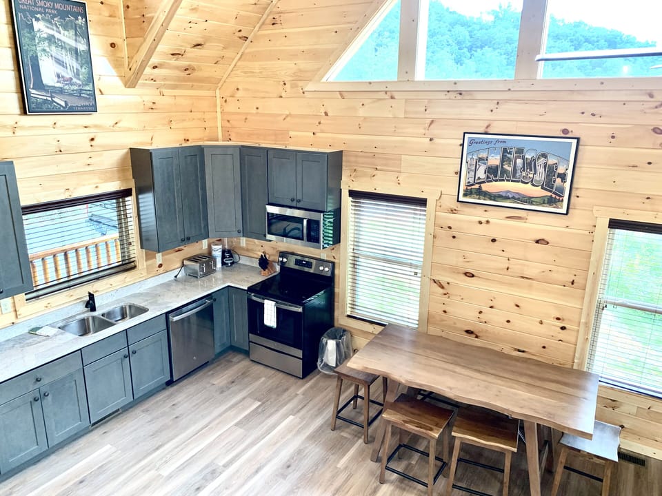 View of kitchen and dining area from second level - View of kitchen and dining area from second level