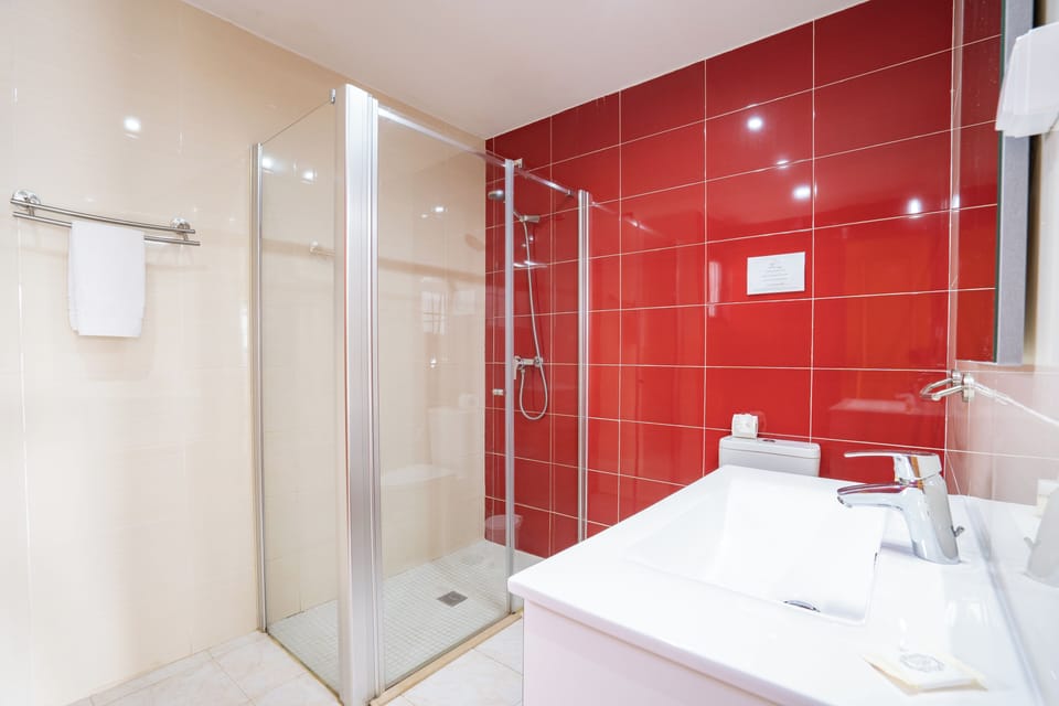 Shower, towels, soap, shampoo