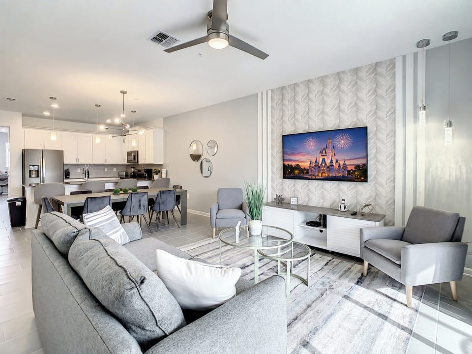 Spacious Living Room with Smart TV and Open Dining Area