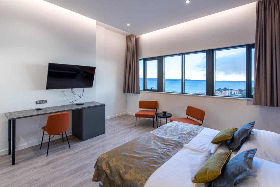 Premium bedding, memory foam beds, minibar, desk