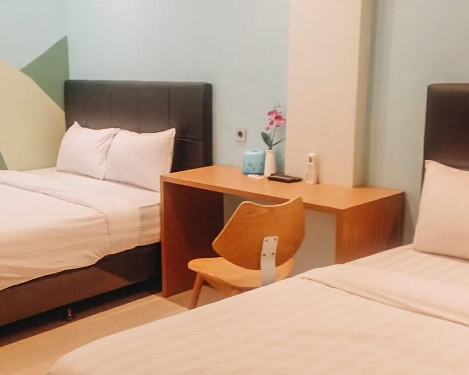 Family Studio Suite | Minibar, free WiFi, bed sheets