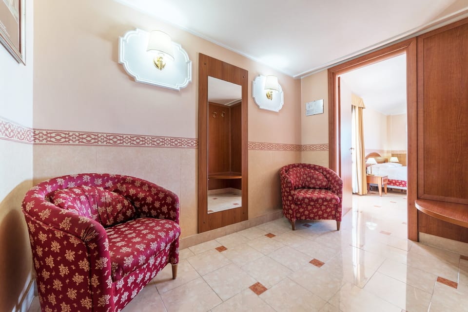 Junior Suite with Terrace | Down comforters, minibar, in-room safe, desk