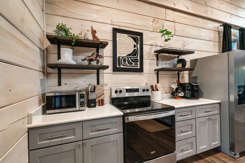 Stainless appliances and everything you'll need to cook delicious meals. 