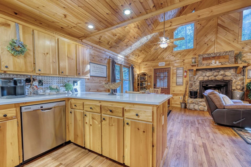 Our kitchen features wood cabinets, expansive counter space, and stainless steel appliances. It combines functionality and style, creating the perfect space for cooking and entertaining.