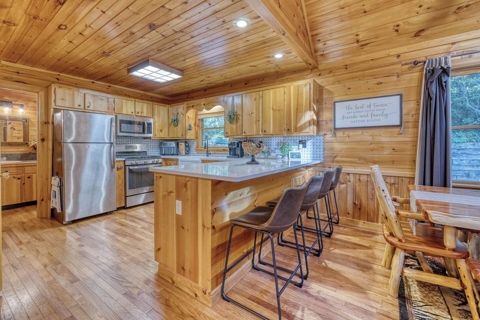 Bright, spacious kitchen with a gas stove, cookware, dishes, spices, oils, coffee supplies, and the essentials needed to cook, gather, and feel at home.
