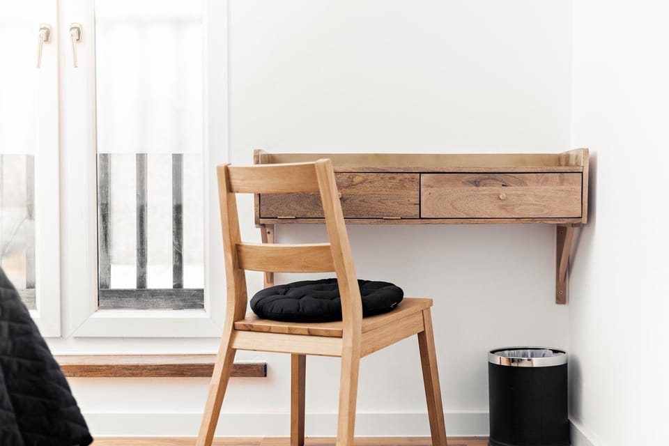 Desk, laptop workspace, free WiFi, bed sheets