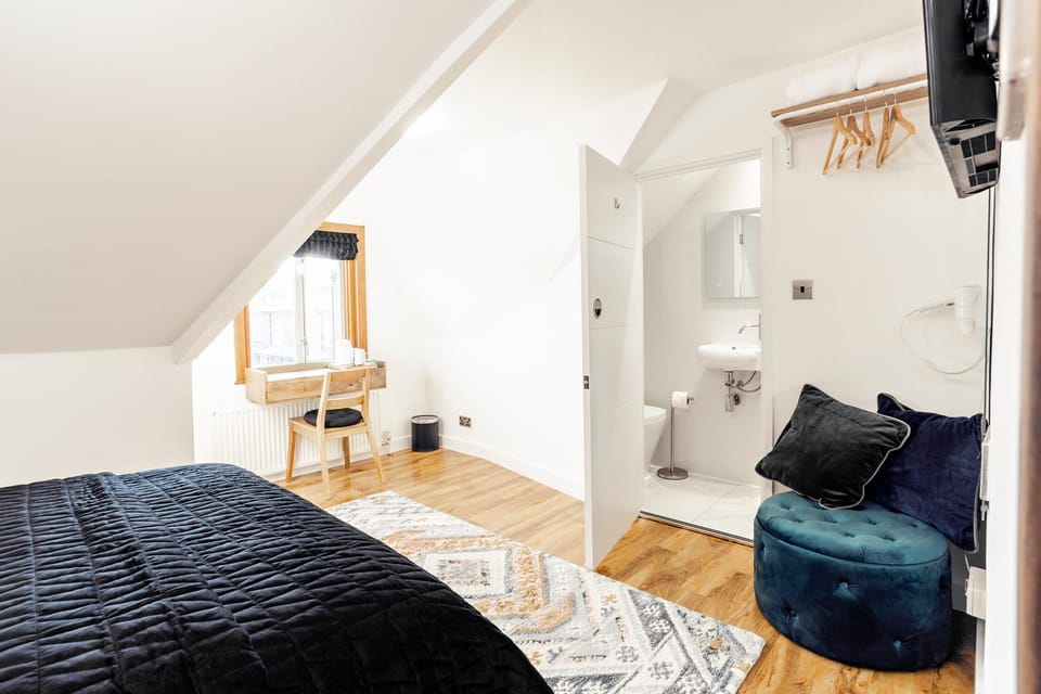 Desk, laptop workspace, free WiFi, bed sheets