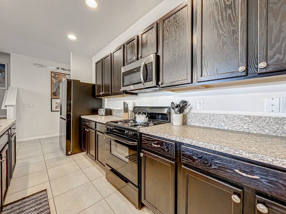Enjoy cooking and chatting in our open kitchen featuring a modern sink and plenty of counter space