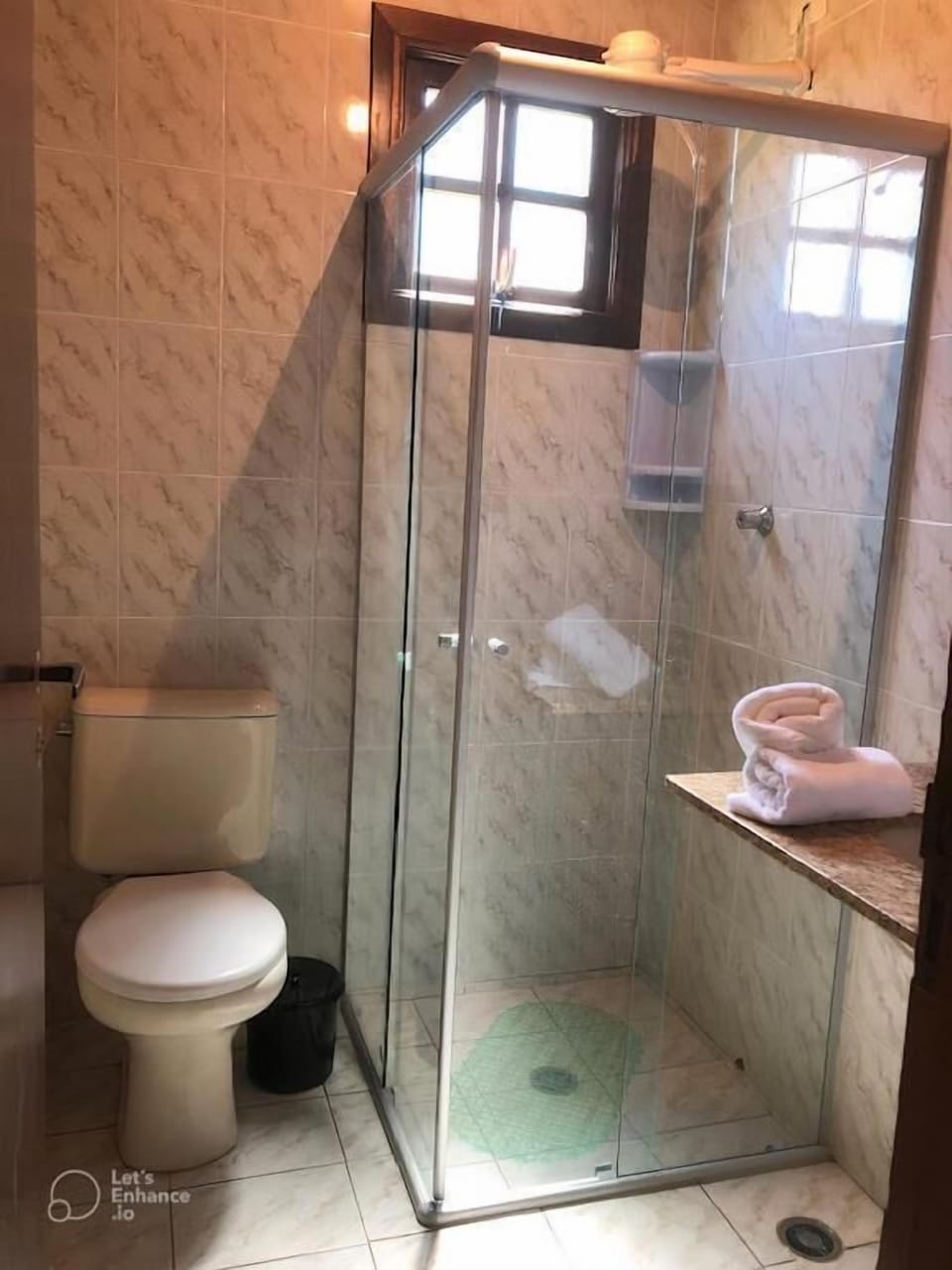 Shower, rainfall showerhead, towels, soap