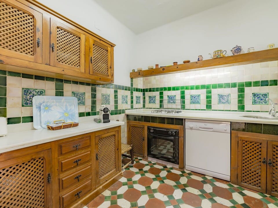 Cabinetry, Property, Kitchen, Interior Design, Architecture, Flooring, Wood, Yellow, Countertop