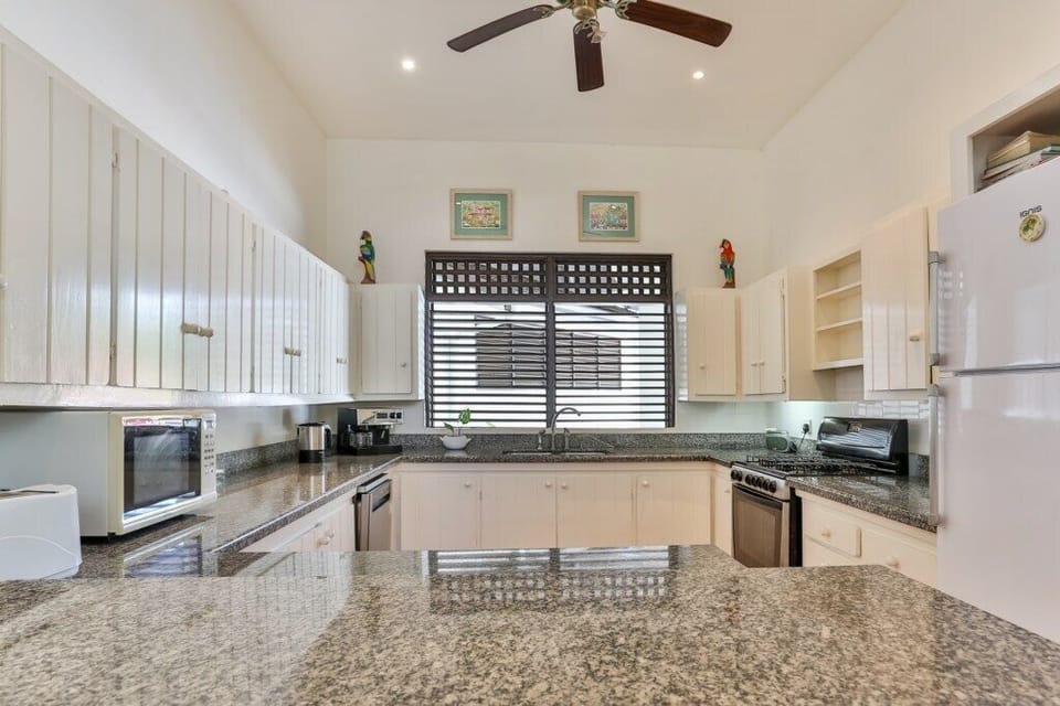 Kitchen with breakfast counter.