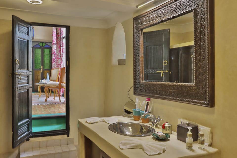 Panoramic Suite, 1 Double Bed, Terrace | Bathroom | Eco-friendly toiletries, hair dryer, bathrobes, slippers